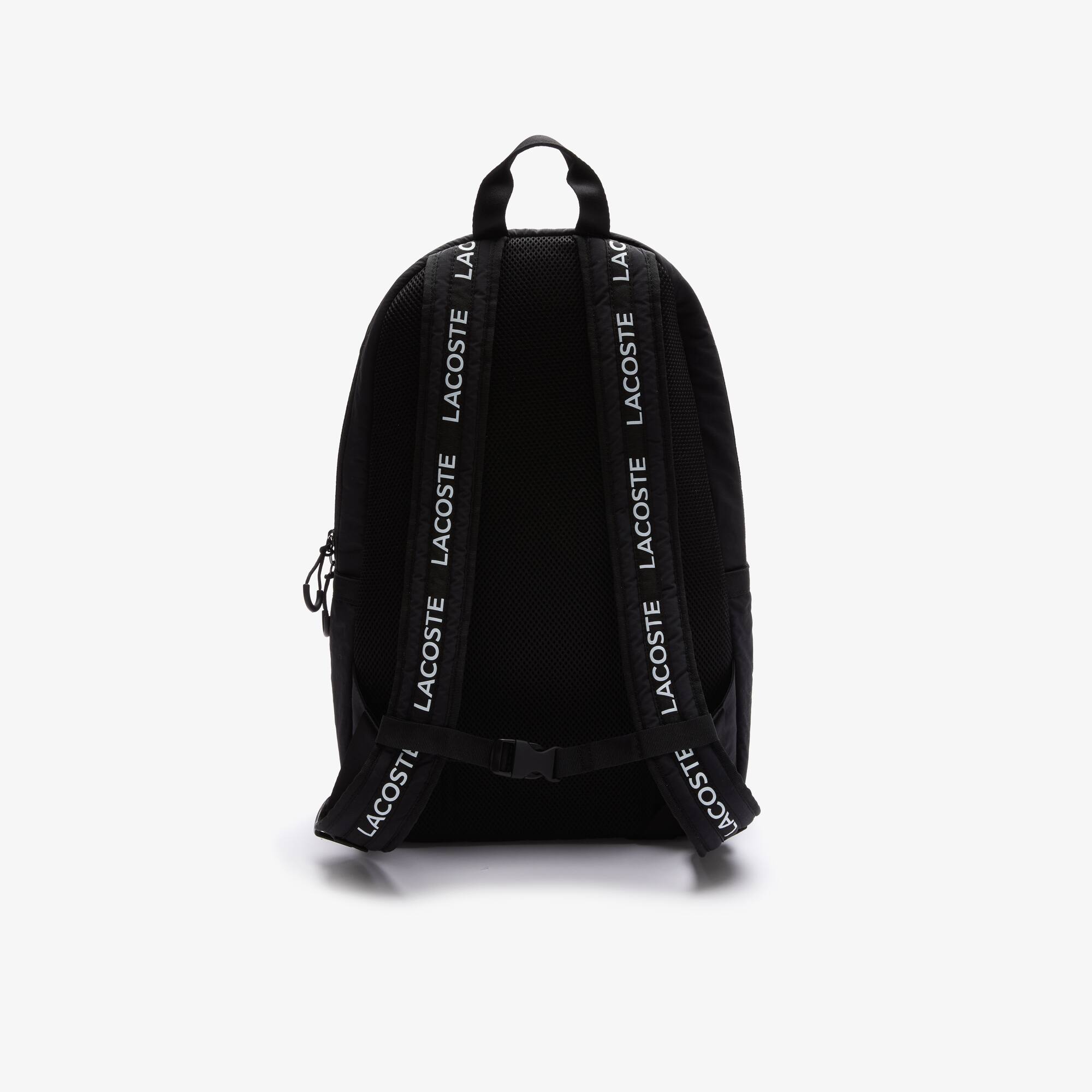 white nylon backpack