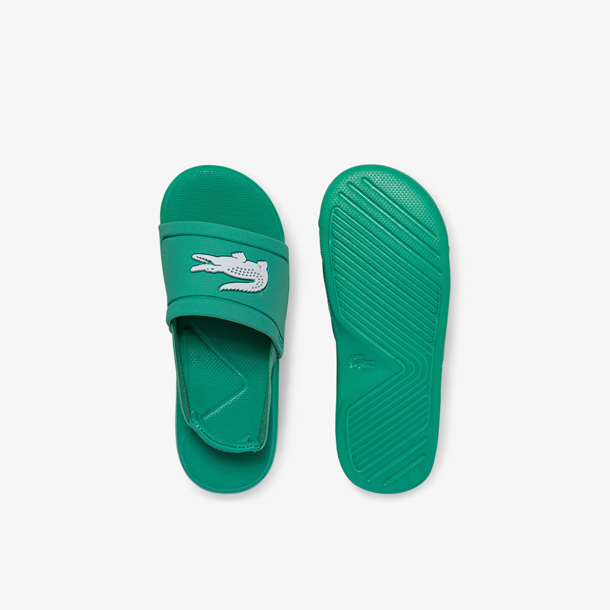 green lacoste slides