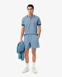 Mid Length Monogram Print Swim Trunks