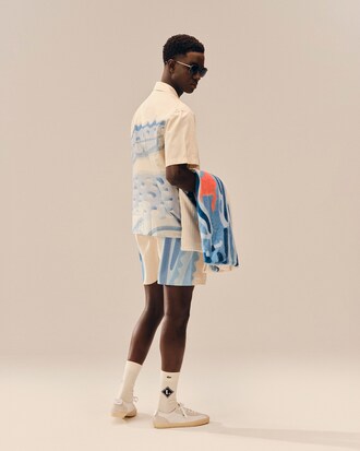 Camisa de rayas con cocodrilo de corte holgado