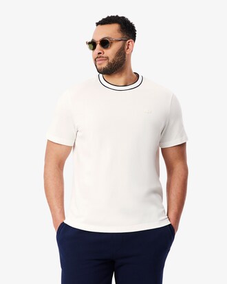 Camiseta de piqu&eacute; el&aacute;stico con cuello de rayas