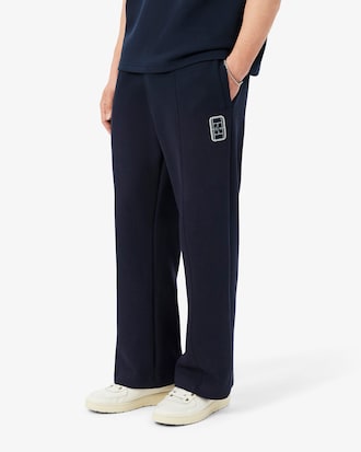 Pantal&oacute;n de ch&aacute;ndal de piqu&eacute; con insignia