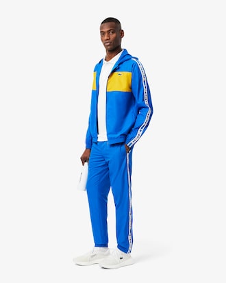 Chaqueta deportiva con bloques de color y cinta de logotipo