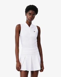 Polo de tenis el&aacute;stico sin mangas de dos tejidos
