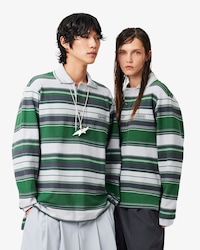 Polo de piqu&eacute; de rayas de corte holgado Lacoste x Wang Yibo