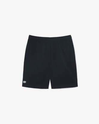 Pantal&oacute;n corto deportivo de tafet&aacute;n diamantado