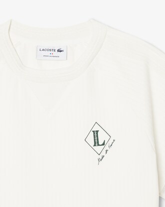 Vestido de canal&eacute; con insignia fabricado en Francia