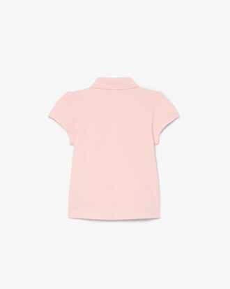 Polo de minipiqu&eacute; con cuello festoneado