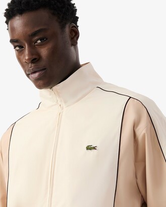 Chaqueta de ch&aacute;ndal hidr&oacute;fuga con bloques de color