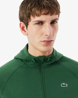 Sudadera deportiva el&aacute;stica con capucha y cremallera