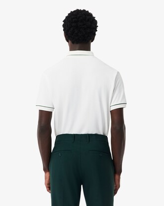 Polo de golf de minipiqu&eacute; termorregulador