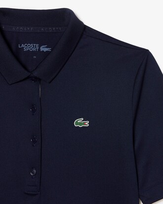 Polo de golf el&aacute;stico de corte ajustado con protecci&oacute;n UV