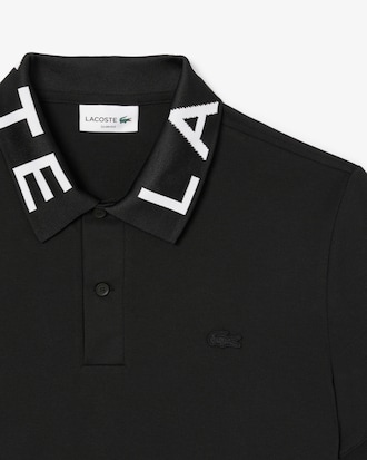 Polo de corte ajustado con detalles de marca en jacquard