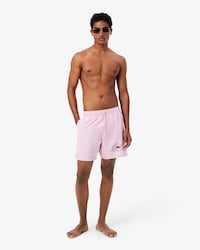 Short de ba&ntilde;o de largo medio con estampado de tenis