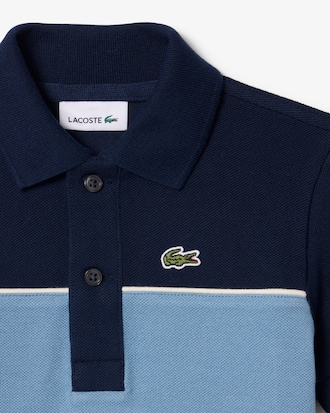 Polo de petit piqu&eacute; con franja en contraste
