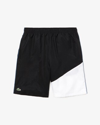 Pantal&oacute;n corto de hombre Lacoste SPORT color block con ribete a contraste