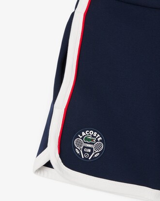 Pantal&oacute;n corto de piqu&eacute; el&aacute;stico cl&aacute;sico de tenis