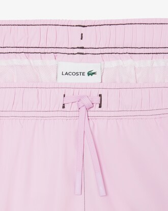 Short de ba&ntilde;o de largo medio con estampado de tenis