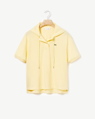 Polo de mujer relaxed fit en minipiqué elástico con capucha