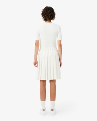 Falda midi plisada con efecto petit piqu&eacute;