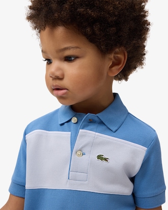 Polo de petit piqu&eacute; con bloques de color