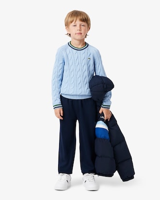 Pantal&oacute;n de ch&aacute;ndal deportivo con raya decorativa