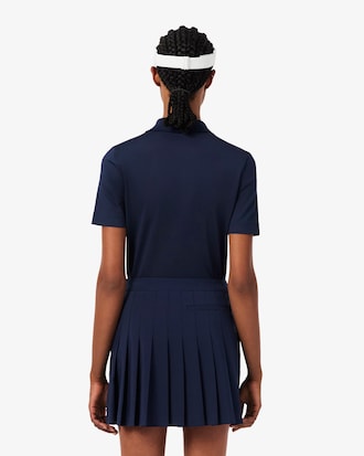 Polo de golf el&aacute;stico de corte ajustado con protecci&oacute;n UV
