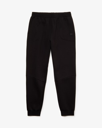 Pantal&oacute;n de deporte de hombre Lacoste Motion en felpa t&eacute;cnica pespunteada