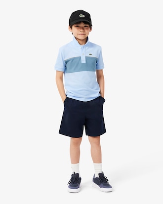 Polo de petit piqu&eacute; con franja en contraste