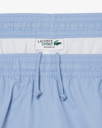 Pantal&oacute;n corto de tenis ligero de rayas con bloques de color