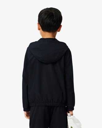 Chaqueta deportiva con capucha y cremallera