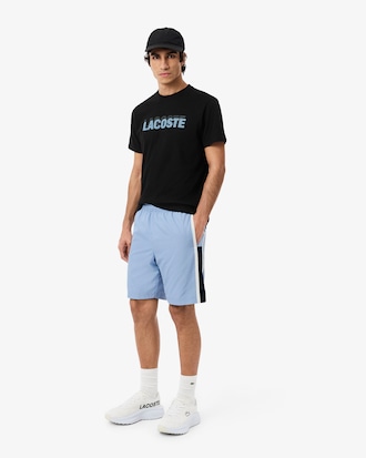 Pantal&oacute;n corto de tenis ligero de rayas con bloques de color