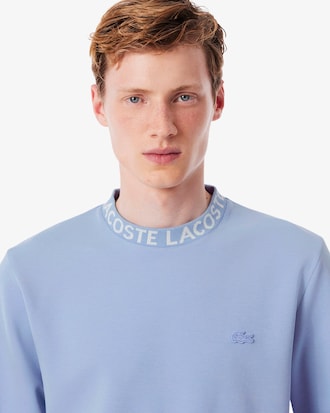 Sudadera de punto jersey con detalles de marca de jacquard