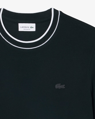 Camiseta de piqu&eacute; el&aacute;stico con cuello de rayas
