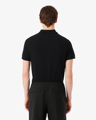 Polo de rayas con logotipo de corte regular