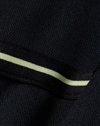 Polo de piqu&eacute; de rayas con detalles de marca Ultra Dry