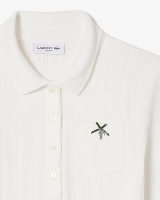 Polo de pointelle de corte ajustado L.12.D con detalles de marca