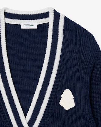 Chaqueta de punto de golf de mezcla de lana con insignia