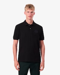 Polo de piqu&eacute; con escudo bordado de corte cl&aacute;sico
