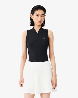 Polo de tenis el&aacute;stico sin mangas de dos tejidos