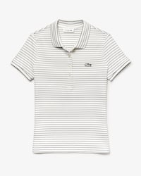 Polo de mujer Lacoste slim fit en minipiqu&eacute; de algod&oacute;n el&aacute;stico de rayas