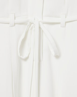 Vestido polo plisado con detalle de bordado Runway