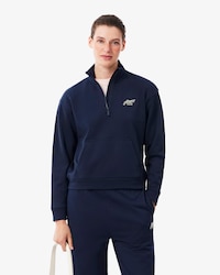 Sudadera de cuello alto con cremallera de felpa con insignia
