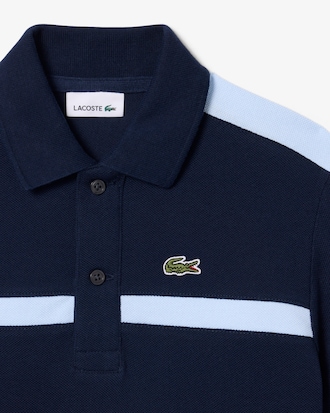 Polo de petit piqu&eacute; con bloques de color