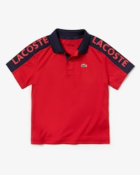Polo de niño Lacoste SPORT en piqué transpirable bicolor con inscripción