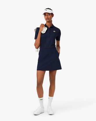 Polo de golf el&aacute;stico de corte ajustado con protecci&oacute;n UV