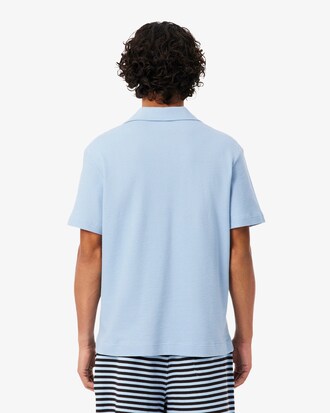 Polo texturizado de corte cl&aacute;sico