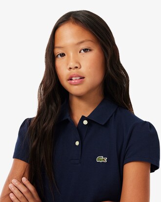 Polo de minipiqu&eacute; con cuello festoneado