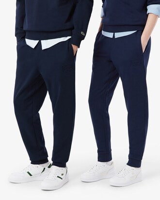 Pantal&oacute;n de ch&aacute;ndal con detalles de marca estampados en relieve