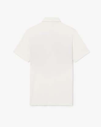 Polo de golf de corte regular con bloques de color